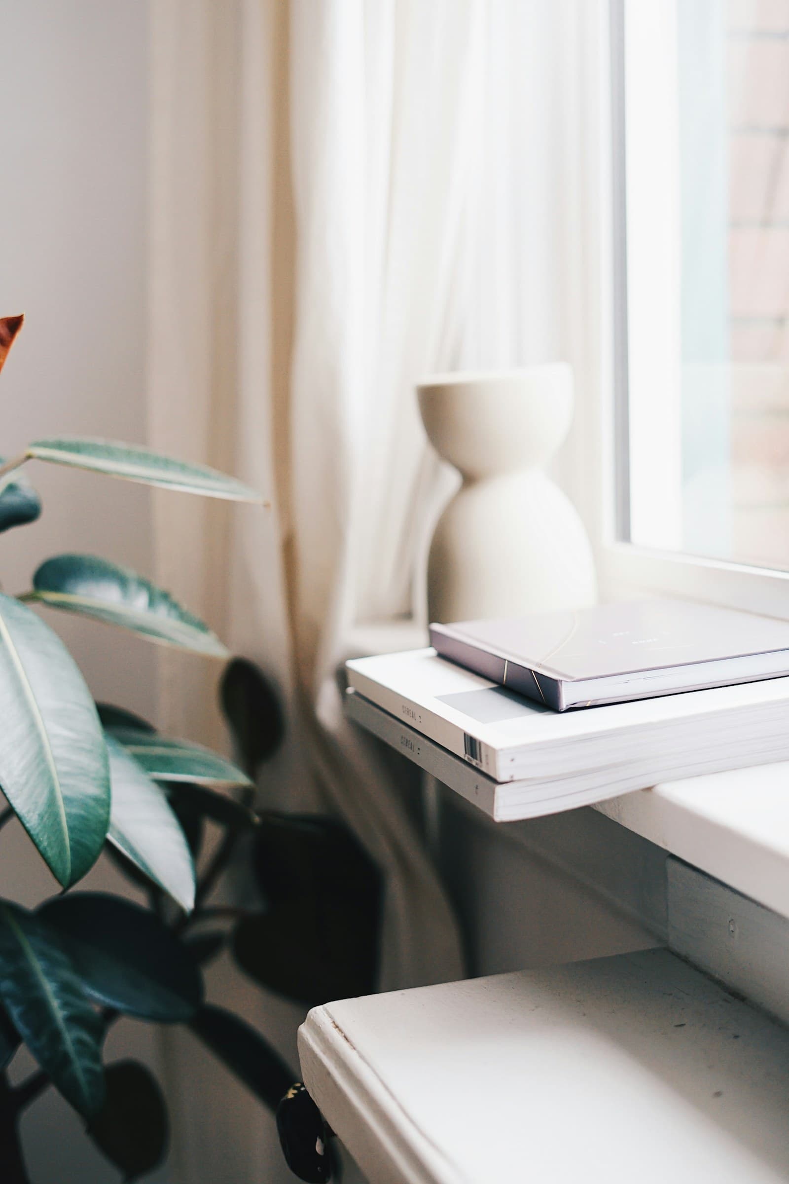 Organized planner, folders, and household papers on a desk